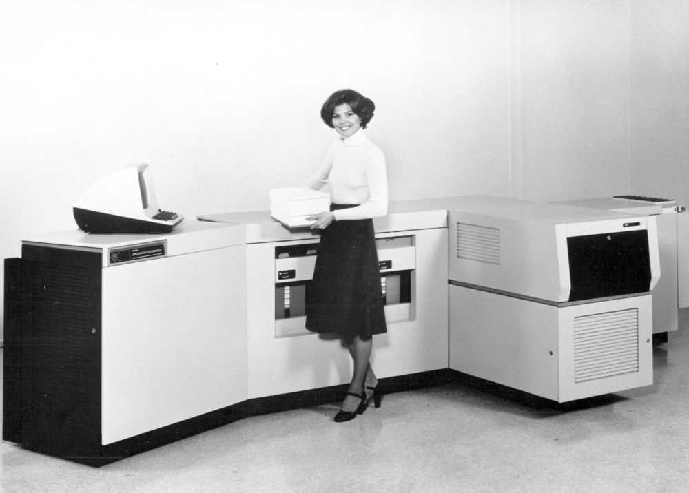 woman making copies 1970s